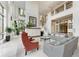 Grand lobby with soaring ceilings, elegant furniture, and natural light at 750 N Tamiami Trl # 814, Sarasota, FL 34236