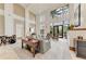 Spacious lobby area with high ceilings, large windows, and comfortable seating at 750 N Tamiami Trl # 814, Sarasota, FL 34236