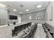 This professionally designed movie room offers a perfect cinematic experience with luxury seating at 750 N Tamiami Trl # 814, Sarasota, FL 34236