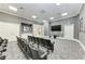 Well-appointed movie room features comfortable seating, large screen, projector and sophisticated decor at 750 N Tamiami Trl # 814, Sarasota, FL 34236