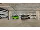 Well-lit parking garage with designated parking spots and modern vehicles at 750 N Tamiami Trl # 814, Sarasota, FL 34236