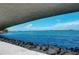 Stunning water view from under a bridge featuring clear blue waters and distant shoreline at 750 N Tamiami Trl # 814, Sarasota, FL 34236