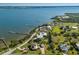 Waterfront homes showcase docks along the canal with stunning views of the coastline and adjacent waterways at 766 Bayshore Dr, Terra Ceia, FL 34250