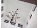 Bright foyer with a unique starburst-themed chandelier and clerestory windows letting in natural light at 766 Bayshore Dr, Terra Ceia, FL 34250