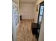 Bright bathroom with open floor plan, featuring wood look tile floors and modern bathroom accessories at 775 36Th S Ave, St Petersburg, FL 33705