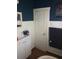 Stylish bathroom features a modern vanity with white cabinets and classic white door at 775 36Th S Ave, St Petersburg, FL 33705