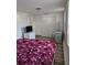Bedroom showcasing double door closet and wood-look tile floor at 775 36Th S Ave, St Petersburg, FL 33705