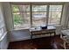Bright dining room looks out on a back yard with a hot tub on a deck at 775 36Th S Ave, St Petersburg, FL 33705
