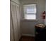 Narrow hall has built-in storage, a fire extinguisher and a window with bright light at 775 36Th S Ave, St Petersburg, FL 33705