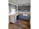 Well-lit kitchen featuring light wood countertops, grey cabinetry, and tiled backsplash at 775 36Th S Ave, St Petersburg, FL 33705