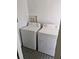 Efficient laundry area with white washer and dryer units in a clean, well-lit space at 775 36Th S Ave, St Petersburg, FL 33705