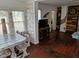 Open living space with wood-look floors and natural light with seamless flow to the dining area at 775 36Th S Ave, St Petersburg, FL 33705