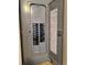 An open, modern electrical panel shows labeled circuit breakers and clear notes at 775 36Th S Ave, St Petersburg, FL 33705