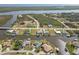 Aerial view of waterfront homes, showcasing the serene canals and lush green surroundings at 9317 Saint Paul Drive, Port Charlotte, FL 33981