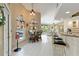 Breakfast nook with bar top seating, casual seating area with pool views at 9317 Saint Paul Drive, Port Charlotte, FL 33981