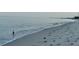 Quiet morning walk along the beautiful beach at 9393 Midnight Pass Rd # 506, Sarasota, FL 34242