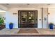 Front entrance to the Pointe at Siesta Key featuring a mat and double doors at 9393 Midnight Pass Rd # 506, Sarasota, FL 34242