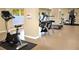 Well-equipped gym with modern exercise equipment and natural light at 9393 Midnight Pass Rd # 506, Sarasota, FL 34242