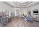 Spacious community clubhouse with ample seating, bookshelves, and elegant decor at 9847 Hawk Nest Ln, North Port, FL 34287