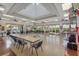 Spacious meeting room with large windows, modern lighting, and ample seating at 9847 Hawk Nest Ln, North Port, FL 34287