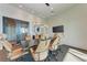 Community conference room with modern lighting, large table, and comfortable seating at 995 Waterline Ct, Sarasota, FL 34240