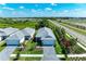 Beautifully landscaped new construction home features a paver driveway and two-car garage at 995 Waterline Ct, Sarasota, FL 34240