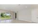 Bright living room featuring sliding glass doors leading to the outdoor space at 995 Waterline Ct, Sarasota, FL 34240