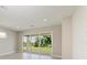 Living room featuring sliding glass doors leading to the outdoor space at 995 Waterline Ct, Sarasota, FL 34240