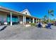 Community clubhouse with a paver patio, outdoor seating and a fire pit at 995 Waterline Ct, Sarasota, FL 34240