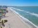 Scenic view of a pristine beach with turquoise waters and soft white sand at 1001 Benjamin Franklin Dr # 510, Sarasota, FL 34236