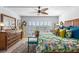 Spacious bedroom featuring natural light, plantation shutters, and stylish furnishings at 1001 Benjamin Franklin Dr # 510, Sarasota, FL 34236