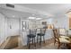 Modern kitchen with stainless steel appliances, granite counters, and breakfast bar seating at 1001 Benjamin Franklin Dr # 510, Sarasota, FL 34236