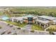The community's clubhouse has ample parking, landscaping and recreational facilities at 10179 Milky Way Cir, Sarasota, FL 34241