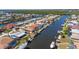 Desirable waterfront property with boat dock along canal nestled within a vibrant coastal neighborhood at 108 Peckham Sw St, Port Charlotte, FL 33952
