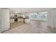 Newly renovated kitchen boasts modern stainless appliances and a spacious design at 108 Peckham Sw St, Port Charlotte, FL 33952