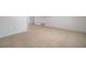 Bright and airy living room with neutral tile flooring and fresh white walls at 108 Peckham Sw St, Port Charlotte, FL 33952