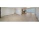 Open-concept floor plan connects the living room to the renovated kitchen at 108 Peckham Sw St, Port Charlotte, FL 33952
