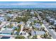 Stunning coastal neighborhood featuring colorful homes, lush palm trees, and access to pristine beaches for a relaxed lifestyle at 110 Oak Ave # A, Anna Maria, FL 34216