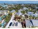 Charming beach community featuring colorful homes, private driveways, and lush tropical landscaping, creating a serene oasis at 110 Oak Ave # A, Anna Maria, FL 34216