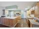Bright kitchen featuring a large island, skylight, and updated appliances at 115 65Th Street Nw Ct, Bradenton, FL 34209