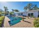 Stunning pool with brick surround offers an inviting outdoor oasis at 115 65Th Street Nw Ct, Bradenton, FL 34209
