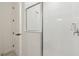 Modern bathroom features a sleek glass-enclosed shower with white subway tile at 11659 Little River Way, Parrish, FL 34219