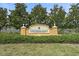 A stone entrance sign with manicured landscaping welcomes residents to Central Park at Lakewood Ranch at 11742 Forest Park Cir, Bradenton, FL 34211