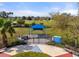 Community playground featuring a covered picnic area and ample green space for recreational activities at 11742 Forest Park Cir, Bradenton, FL 34211