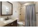 This bathroom features a shower with neutral tile and a modern vanity and sink at 11936 82Nd E St, Parrish, FL 34219