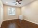 Neutral bedroom with hardwood floor, recessed lighting, ceiling fan, and natural light at 11936 82Nd E St, Parrish, FL 34219