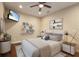 Cozy bedroom with a ceiling fan, stylish decor, and ample natural light at 11936 82Nd E St, Parrish, FL 34219