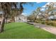 Charming single-story home with a well-kept lawn and a walkway leading to the front entrance at 11936 82Nd E St, Parrish, FL 34219
