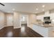 Open floorplan with kitchen island, granite countertops, and stainless steel appliances at 11936 82Nd E St, Parrish, FL 34219
