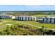 Aerial view of condo buildings and golf course at 12180 Wellen Golf St # 302, Venice, FL 34293